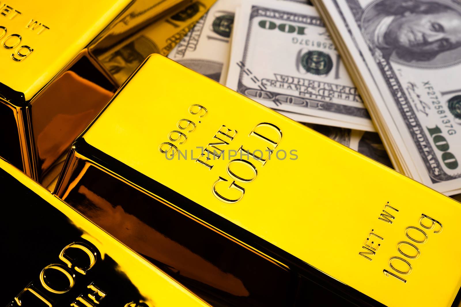 Close up of Gold bars and banknotes. financial concept by ronnarong