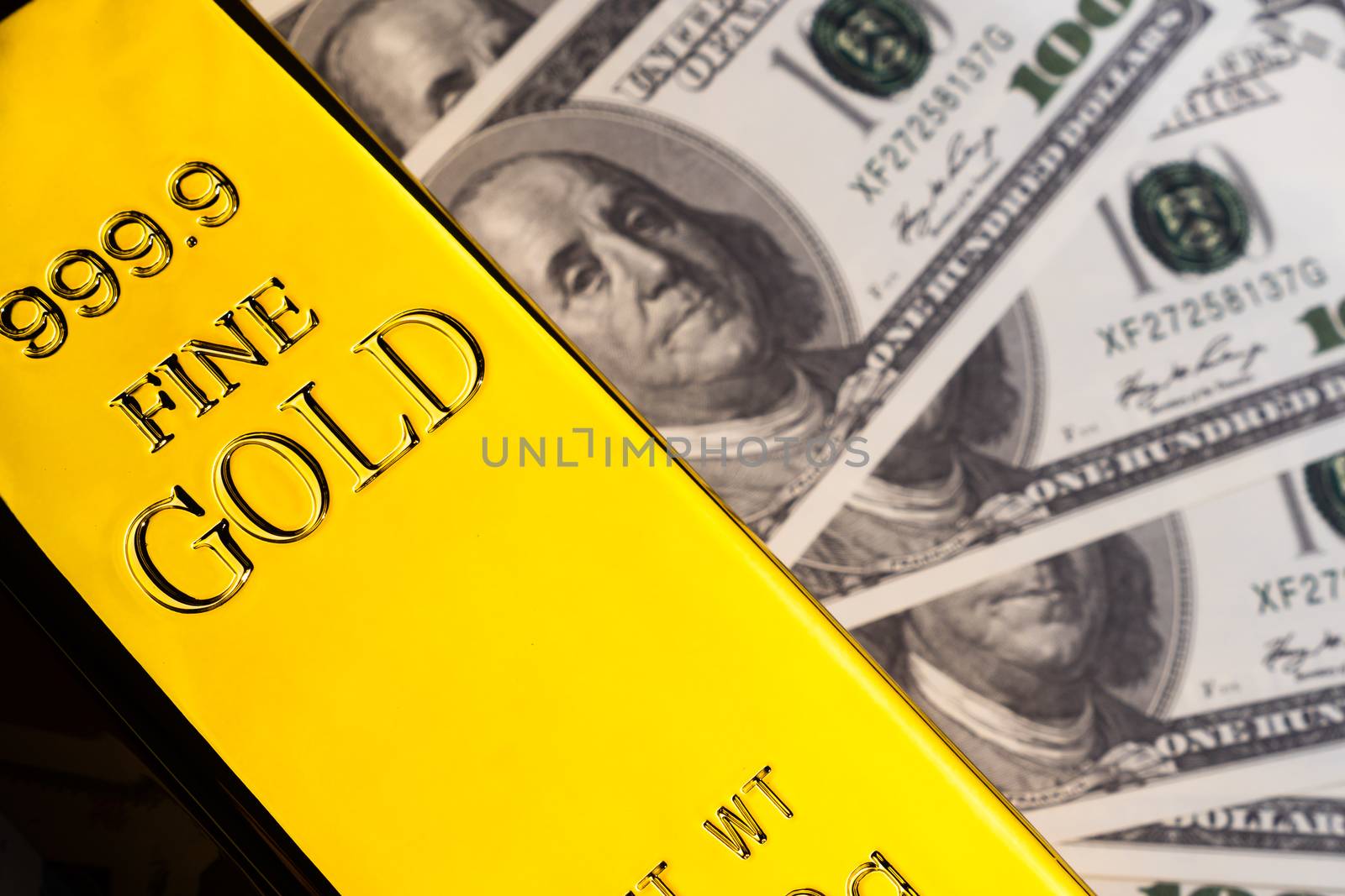 Close up of Gold bar and banknotes. financial concept