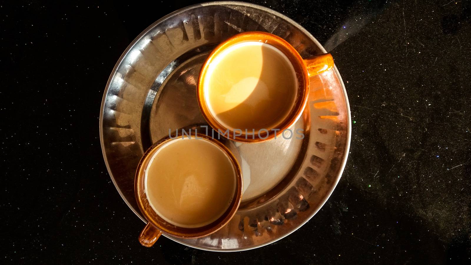 Top view of two cups of Masala Chai by Sonnet15