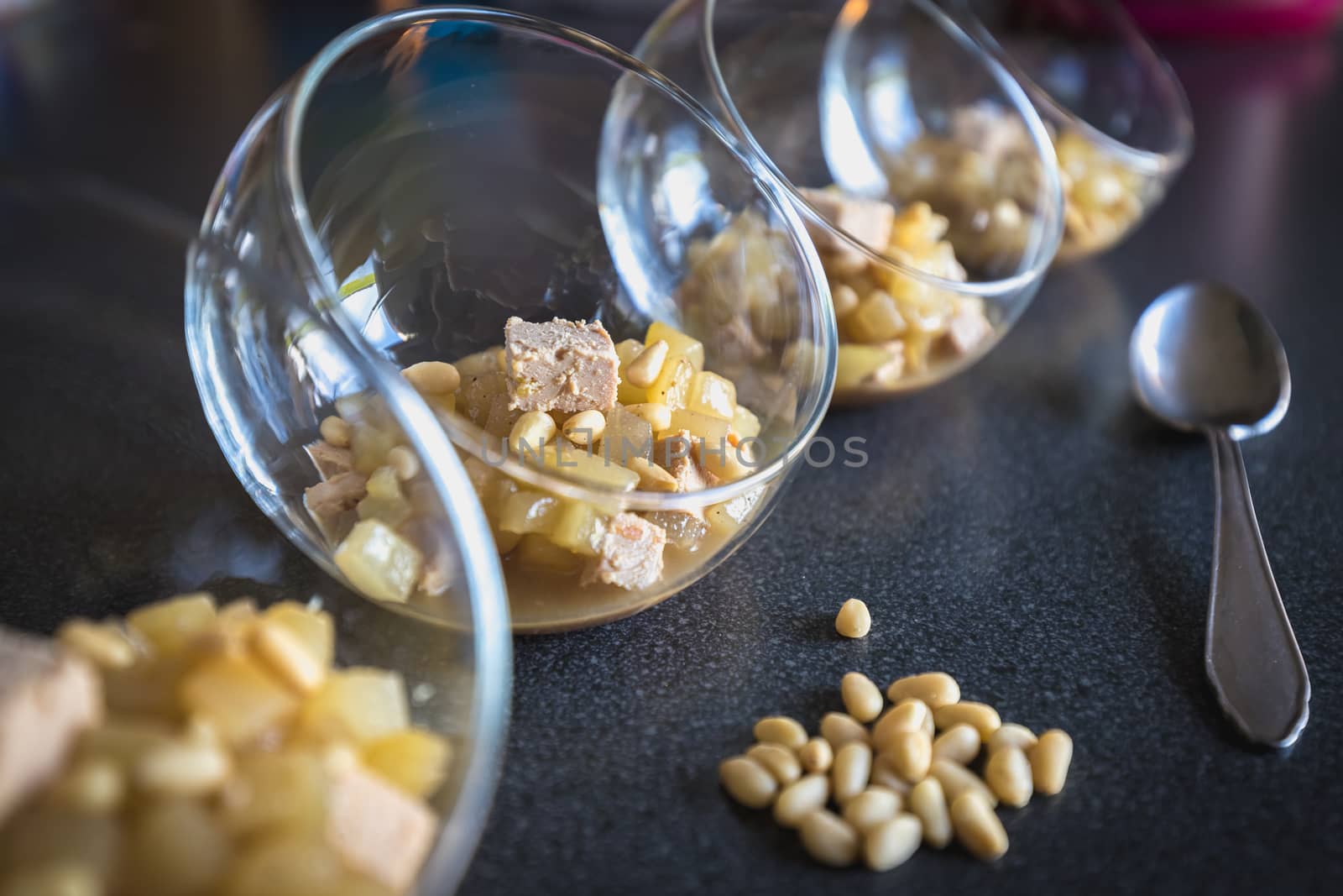 Verrine of pear foie gras and pine nuts in French cuisine