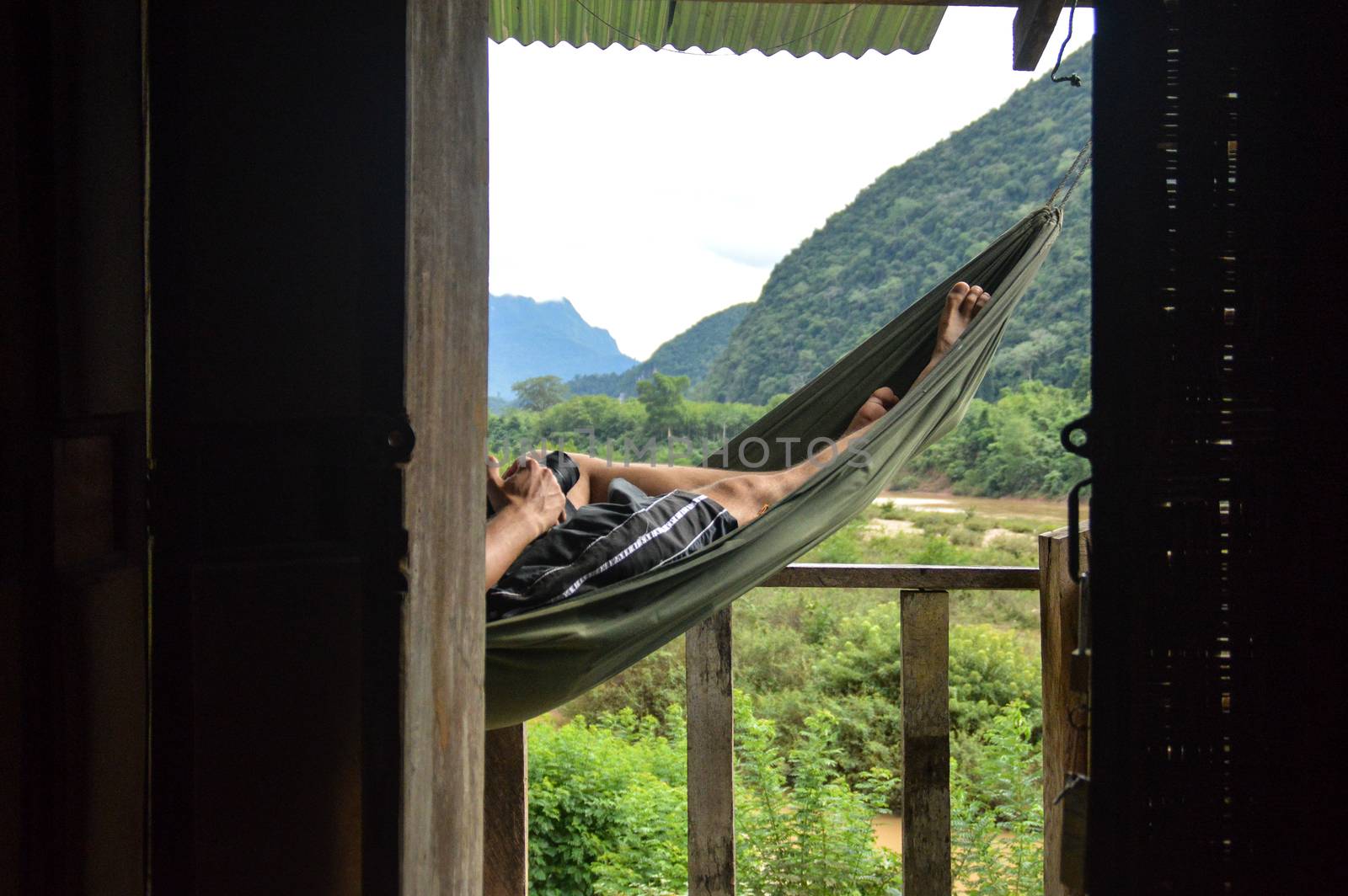 Relaxing in a hammock by Sonnet15