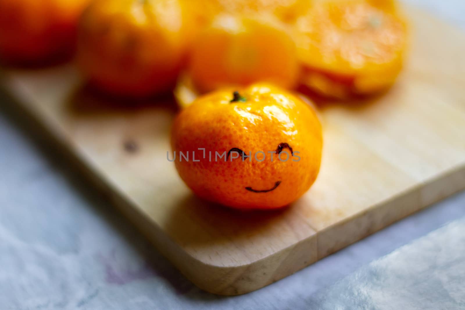 Smiley Face on a Clementine Orange by Sonnet15