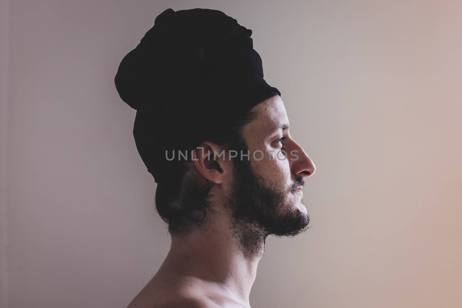 Side view of an attractive man wearing a turban