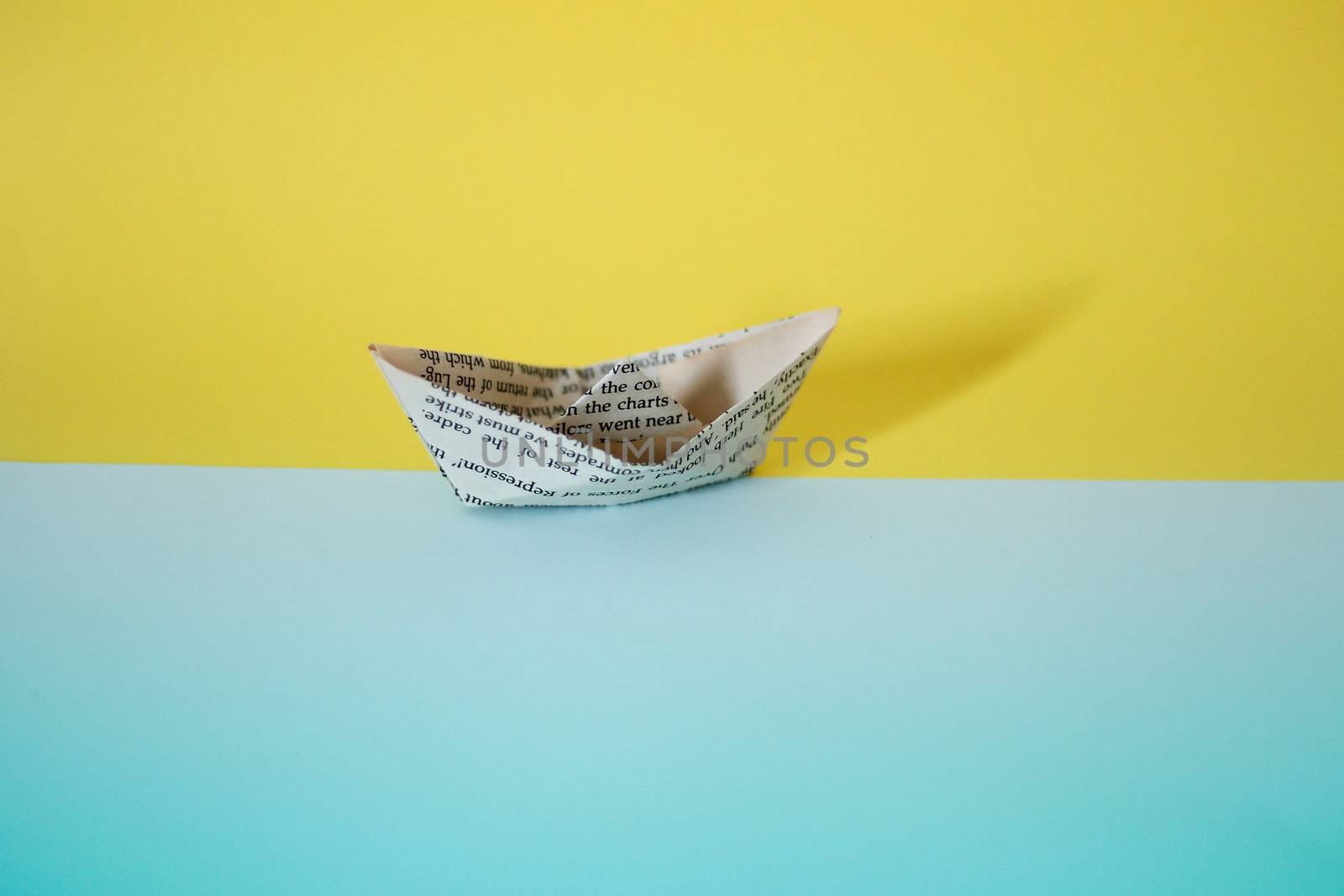 A paper boat made from old newspaper by Sonnet15