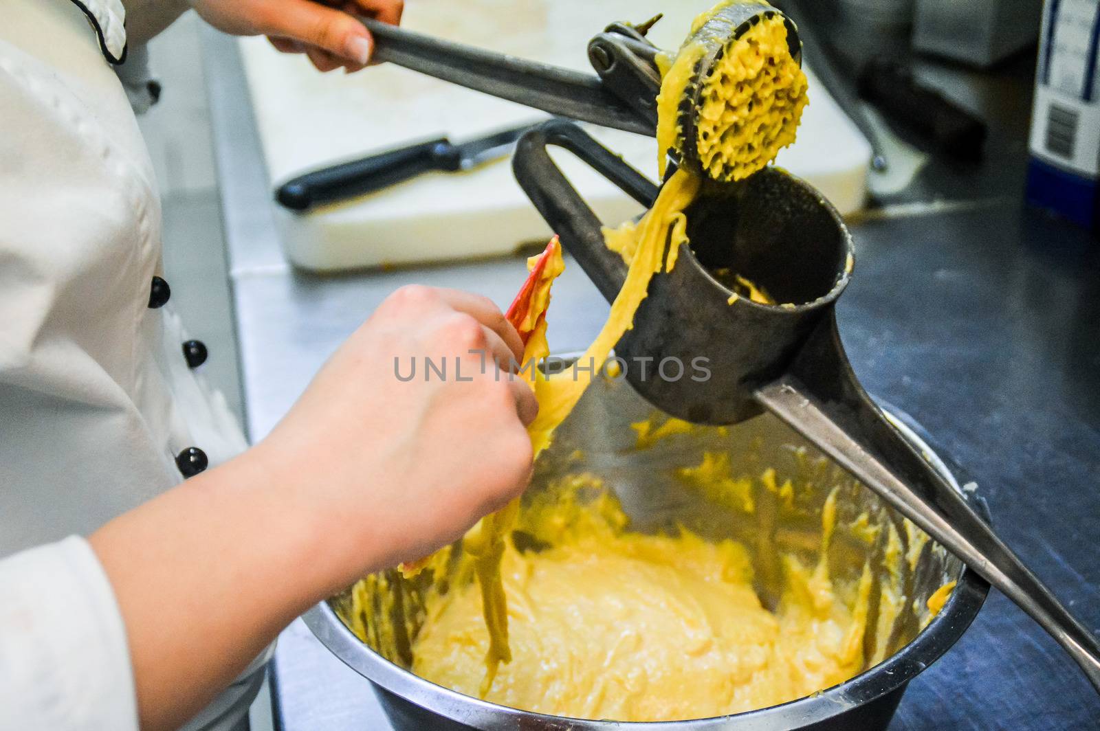 A chef preparing batter by Sonnet15