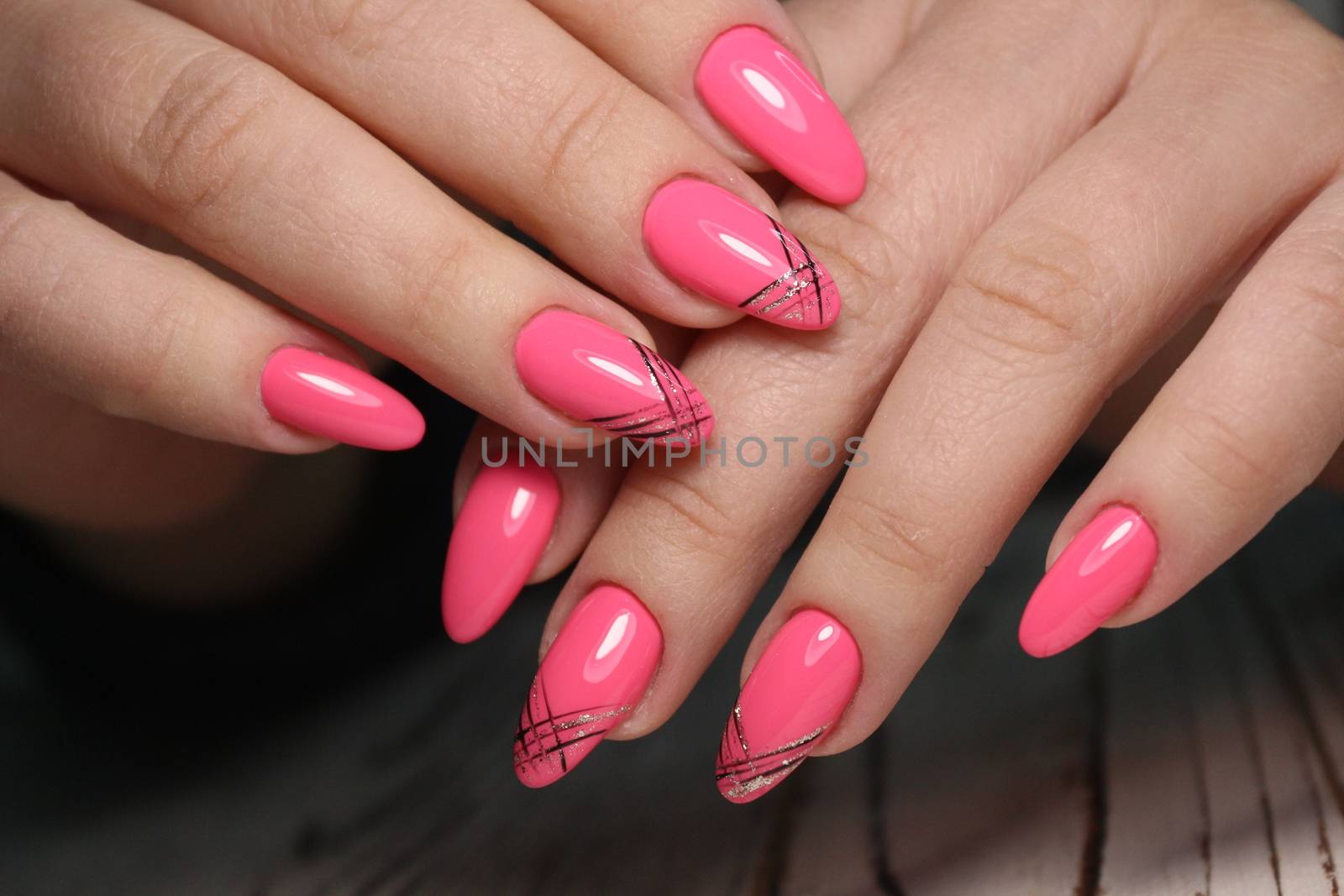 manicure with long nails on a trendy texture background