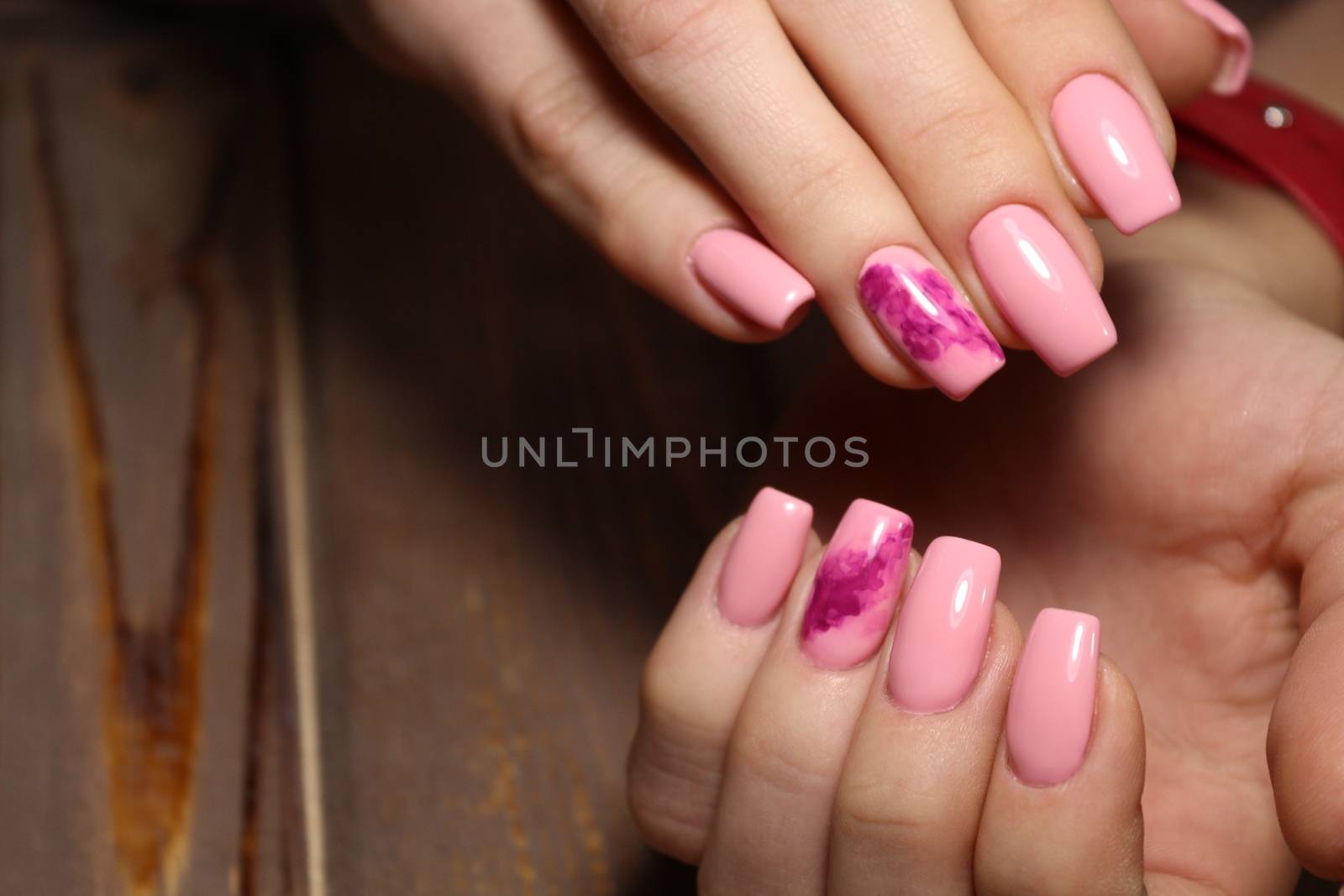 Beautiful woman's nails with beautiful christmas manicure studio