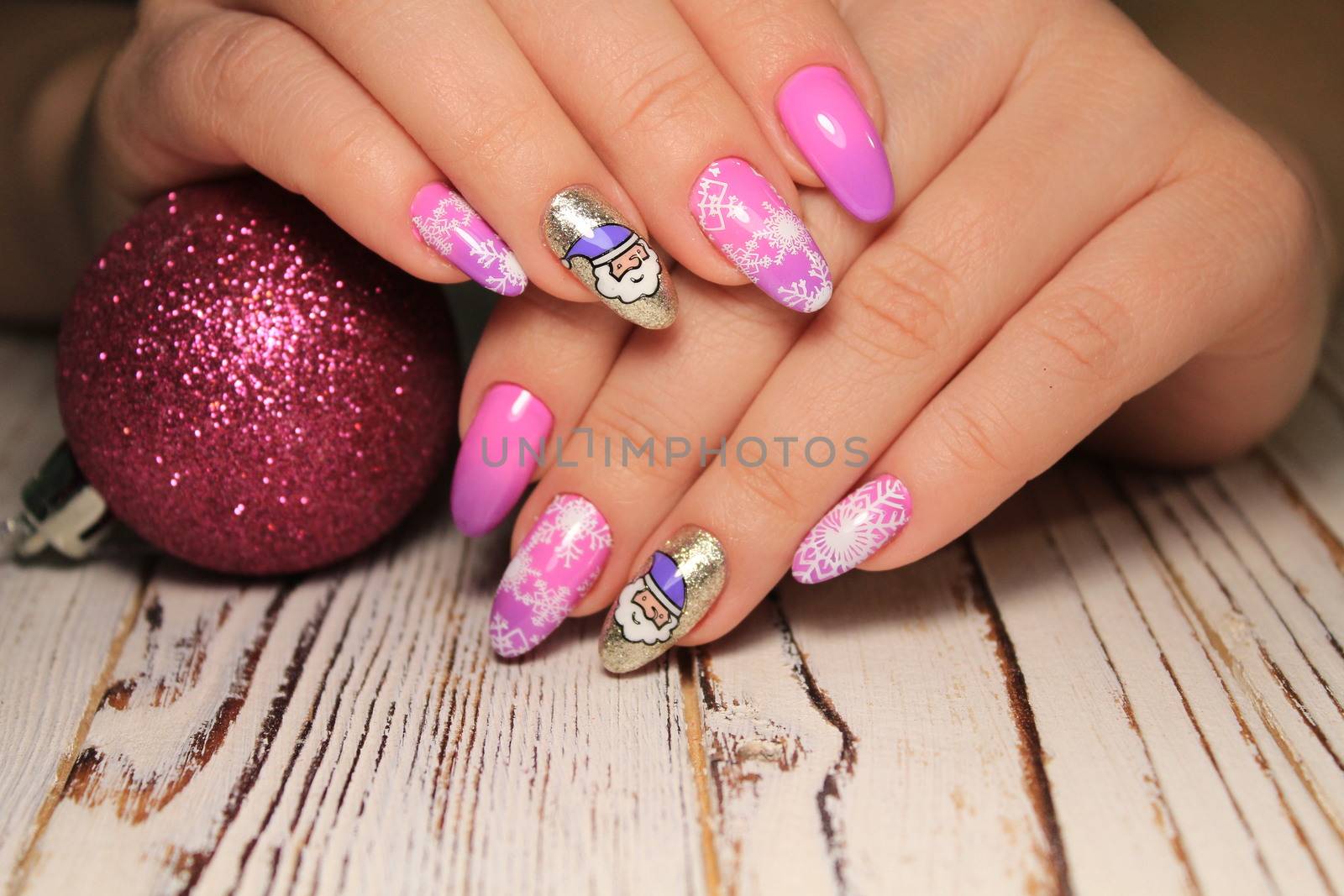 Colorful Christmas nails winter nail designs with glitter,rhinestones, on short and long female nails.