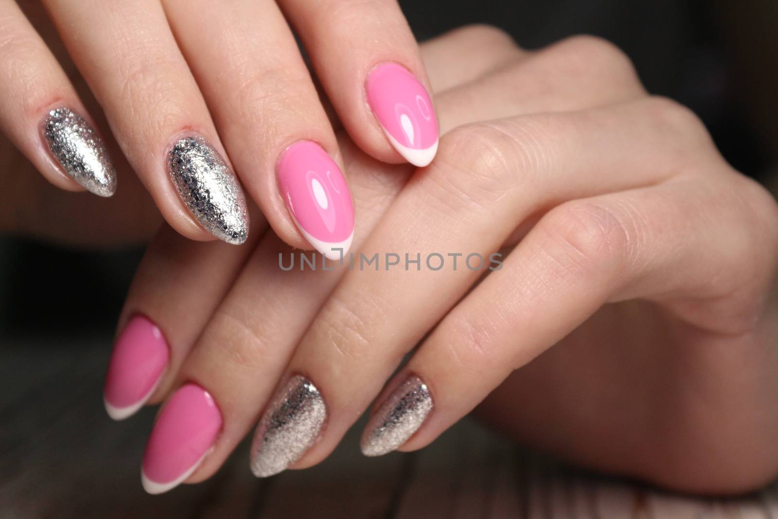 manicure with long nails on a trendy texture background