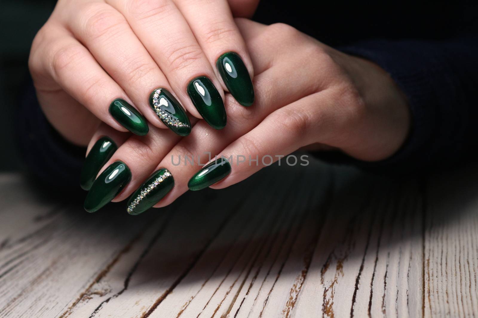 Beautiful woman's nails with beautiful christmas manicure by SmirMaxStock
