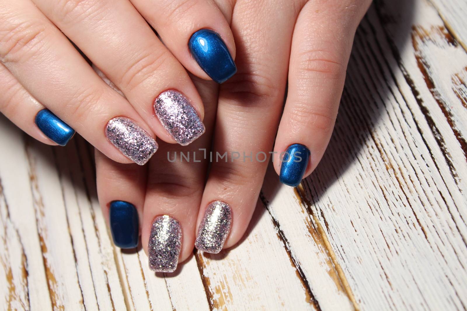 Christmas design manicure with snowflakes. by SmirMaxStock