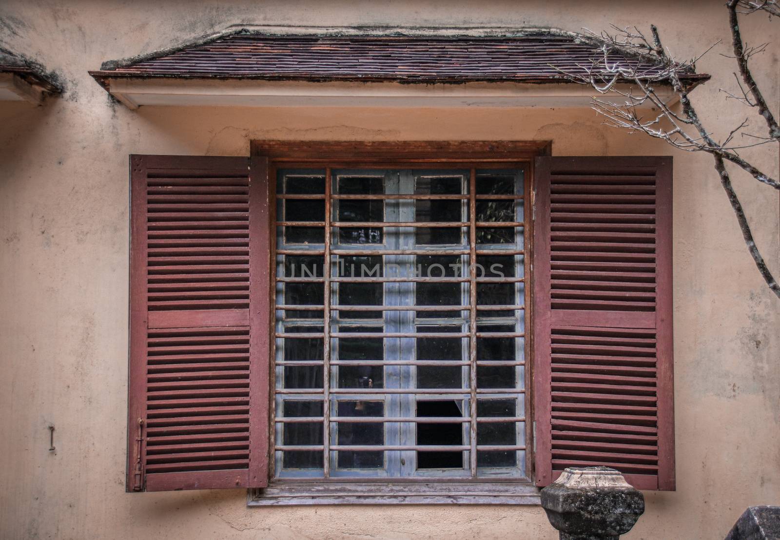 Old rustic french window in Old Quarter or French Quarter Hanoi City