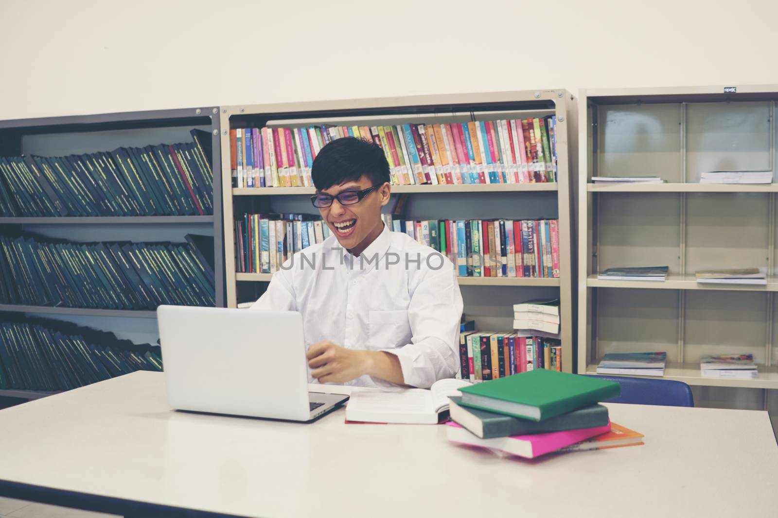 Student making research on laptop and browse internet. Education concept.