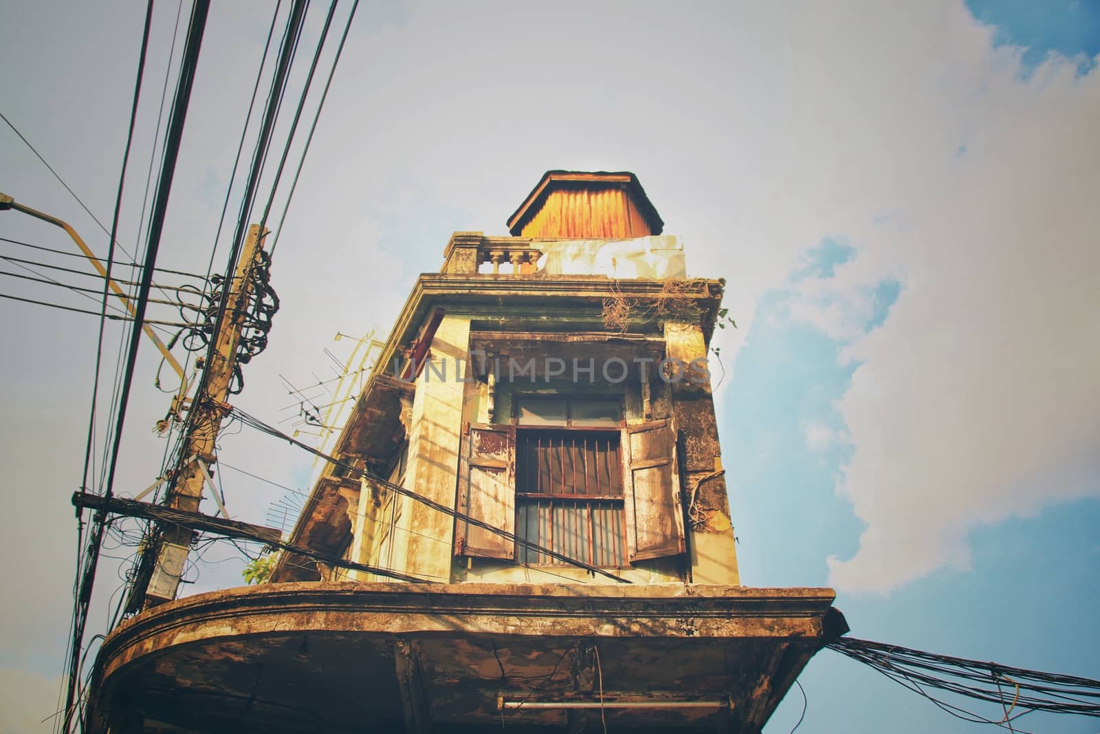 Old abandoned vintage building in Yaowarat Street (Chinatown) in Bangkok City, Thailand