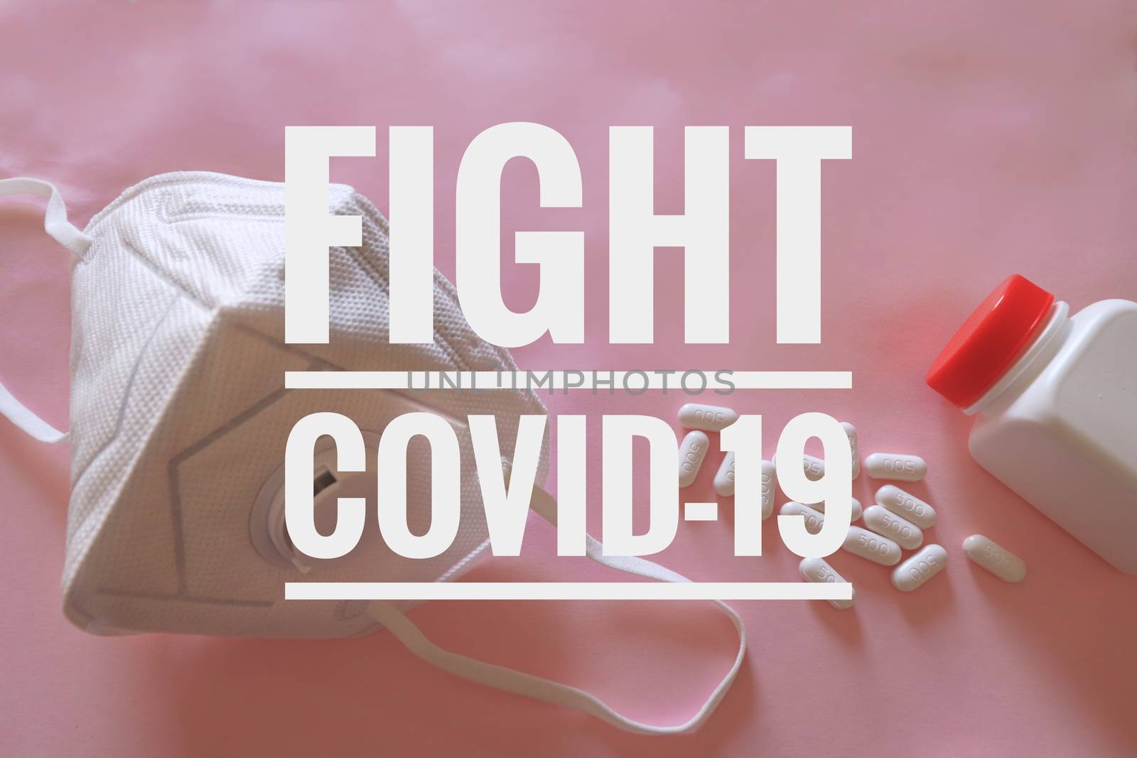 N95 mask against a pink background with the words Fight Covid-19 written on it to raise awareness in fighting the corona virus global pandemic crisis