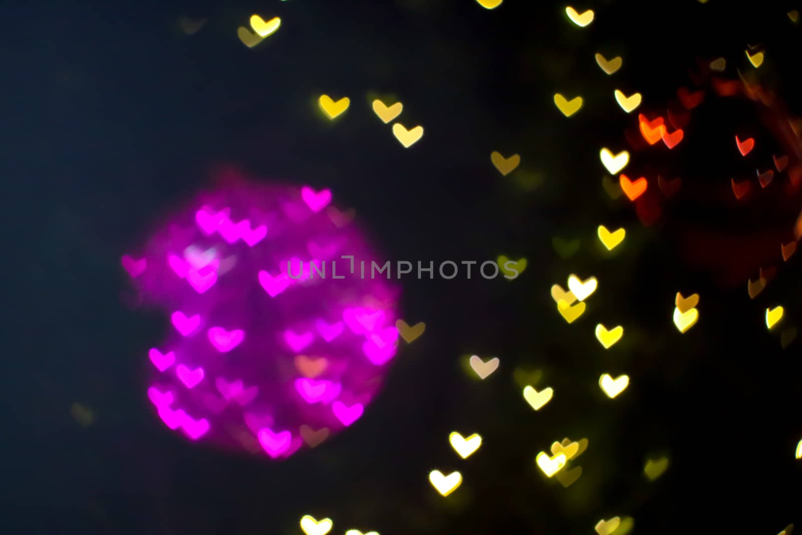 magenta ball abstract bokeh and blur heart shape love valentine's day colorful night light