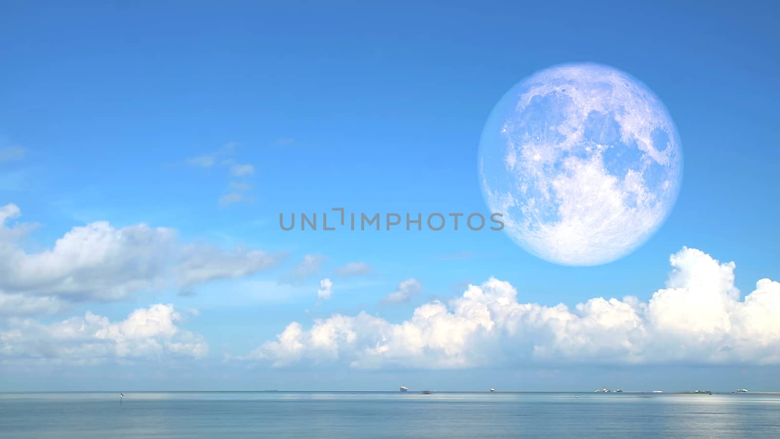 Super strawberry blood moon and blue sky over the sea, Elements of this image furnished by NASA