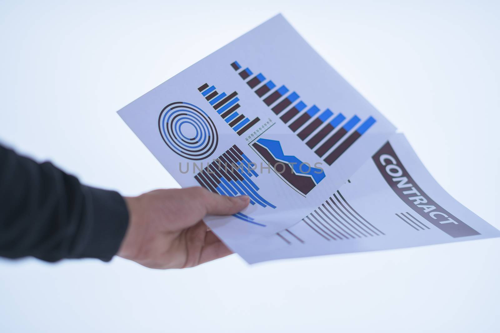 Businessman hand holding a document. Scenes white background.