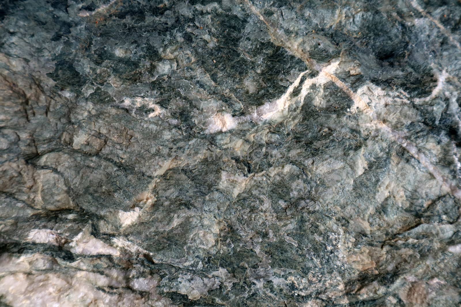 hard heavy granite stone surface of cave for interior wallpaper and line marble background