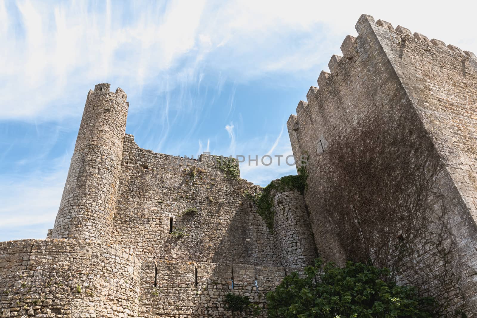Obidos, Portugal - April 12, 2019: architectural detail of the medieval castle of Obidos on a spring day