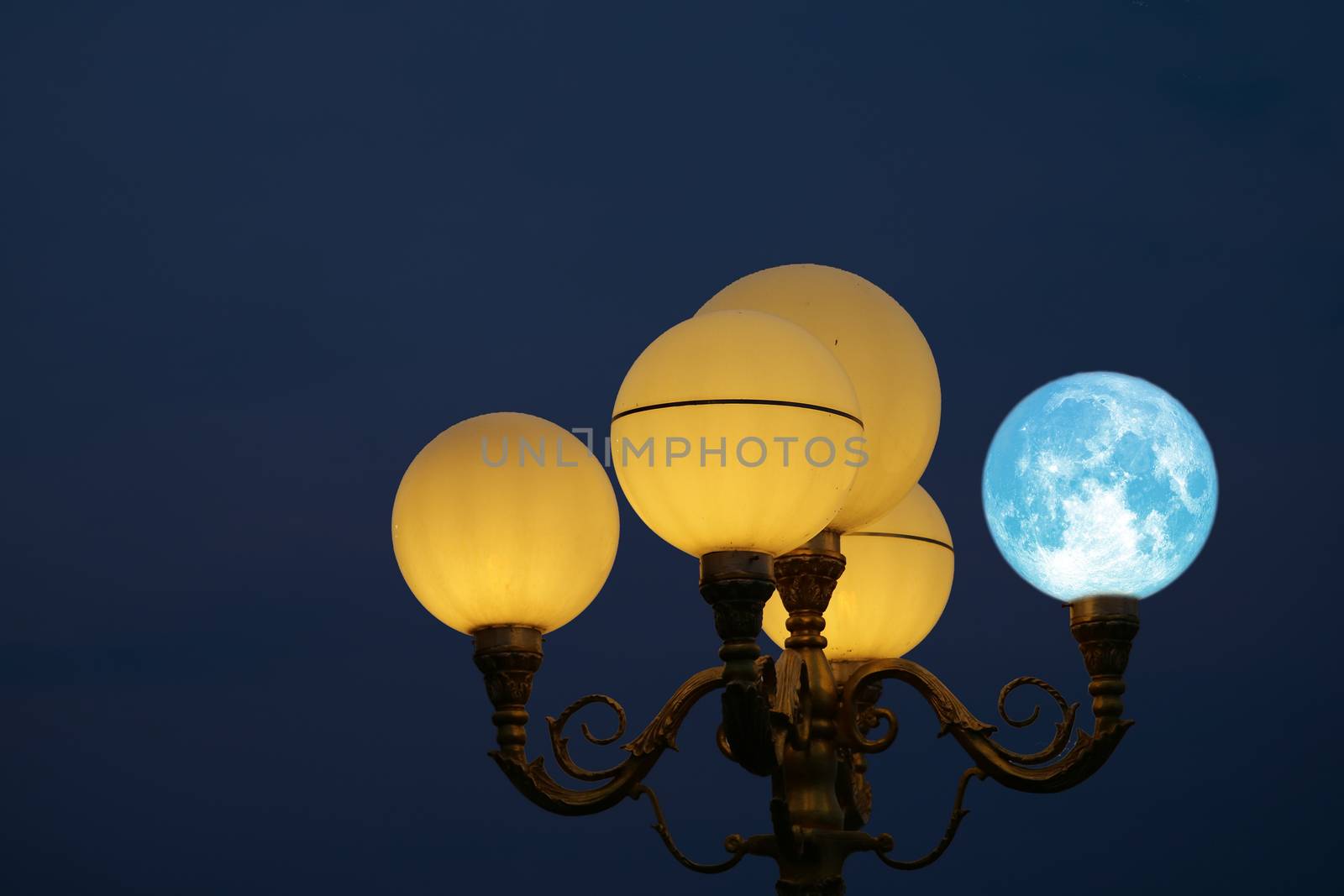 Super blue moon back on light pole in night sky by Darkfox