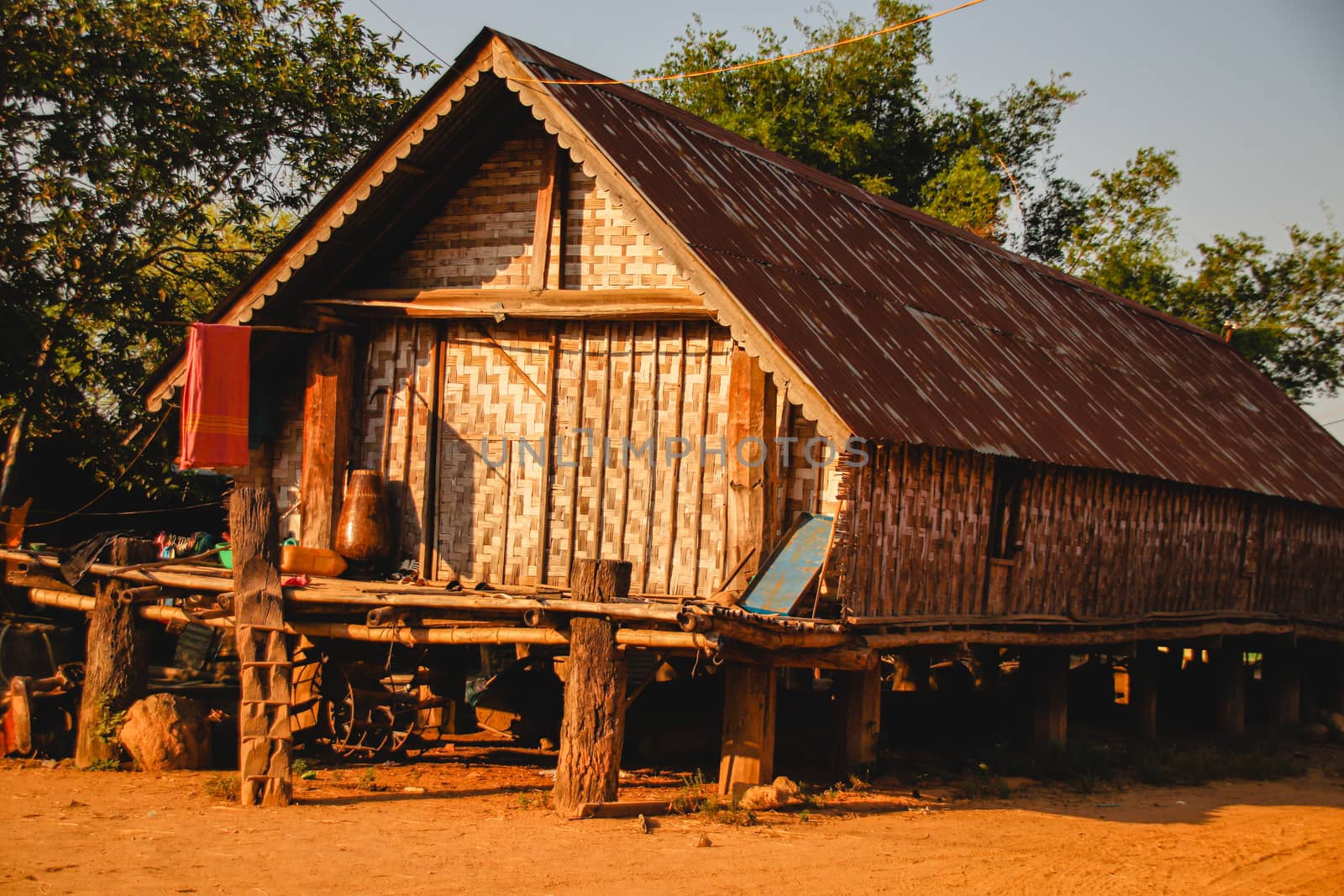 Traditional long house in Buon Don village of Dak LAk Province in the Central Highlands of Vietnam that shows the life, culture and tradition of Vietnamese ethnic tribe