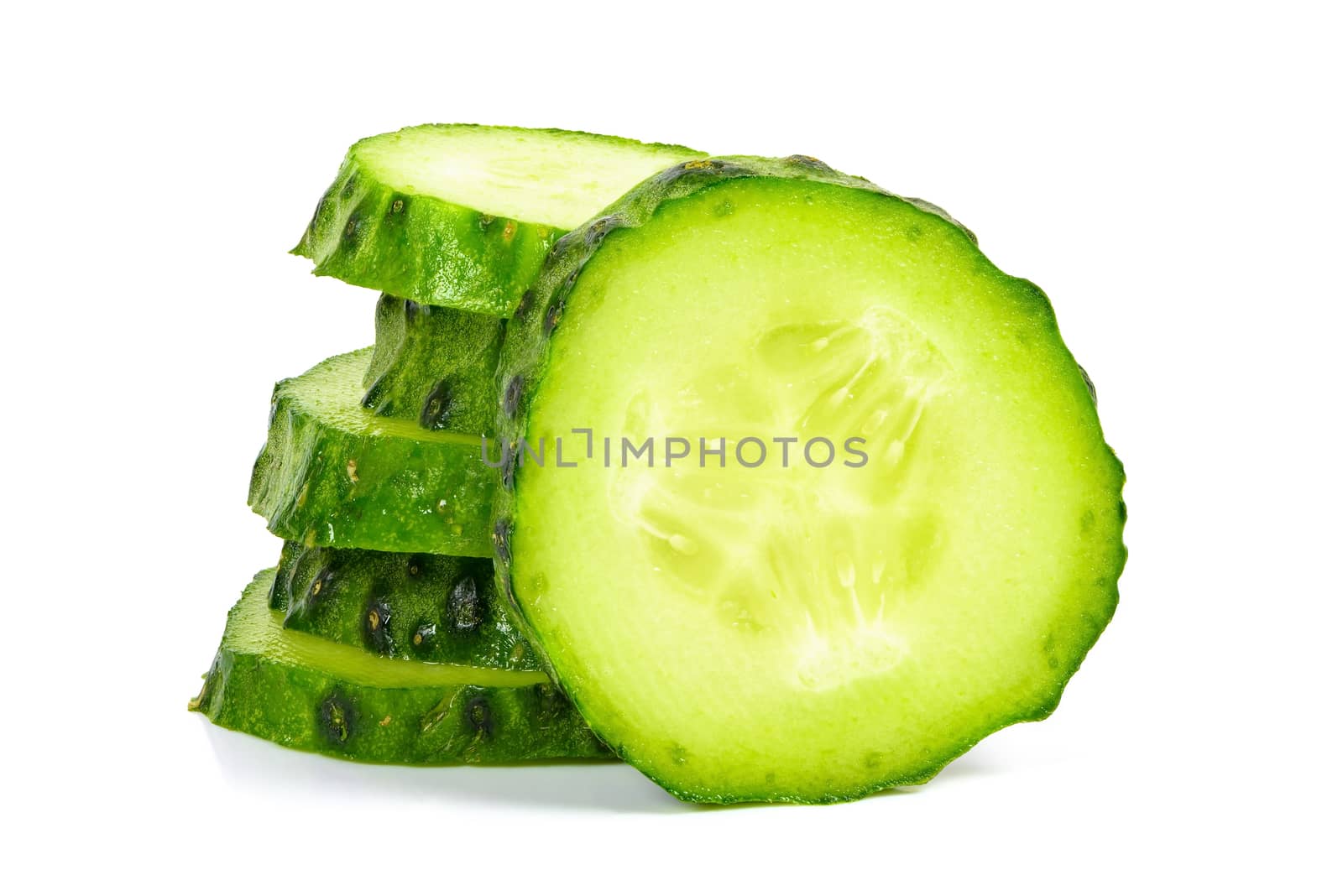 Cucumber slices on white background by mkos83