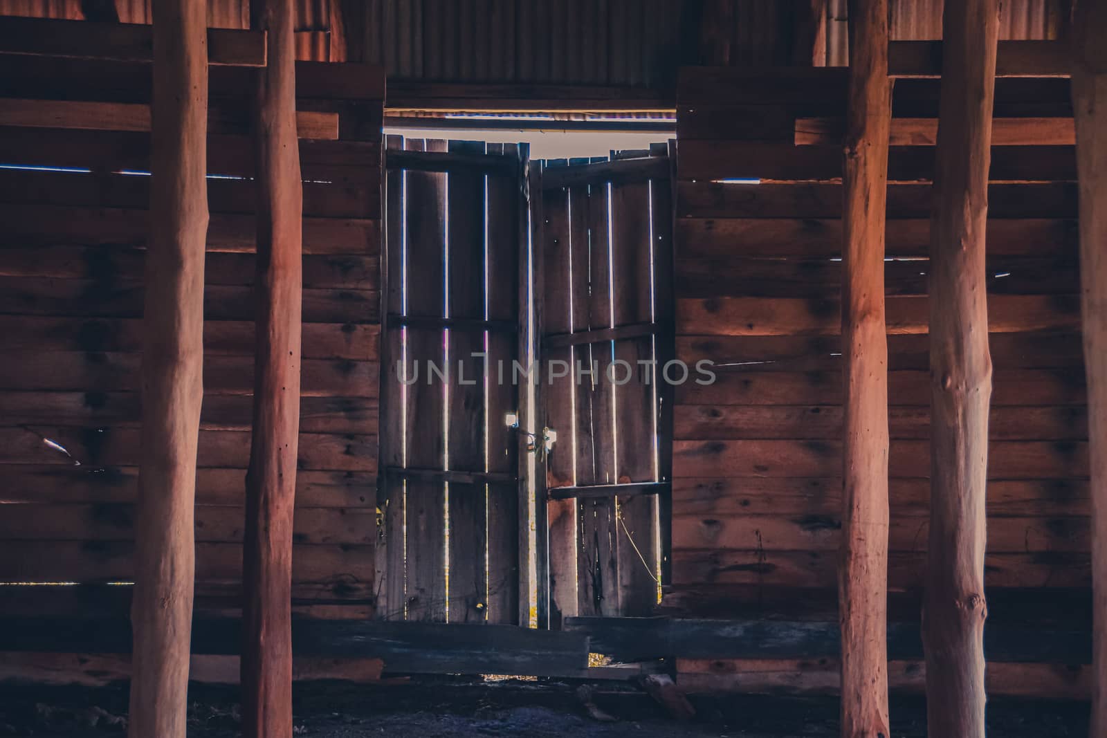 Old wooden shed use to store salt during harvest in the saltfields of Kampot, Cambodia
