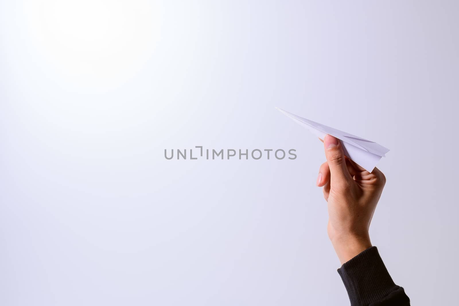 Folding paper rocket handle Against a white background