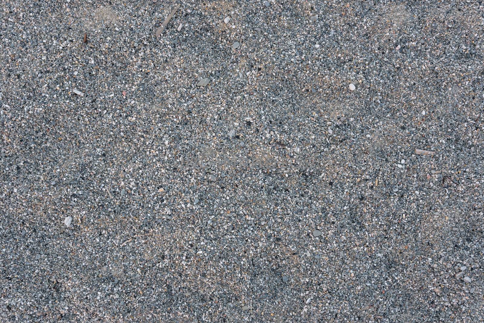 Seamless background ot texture made of gray pebbles