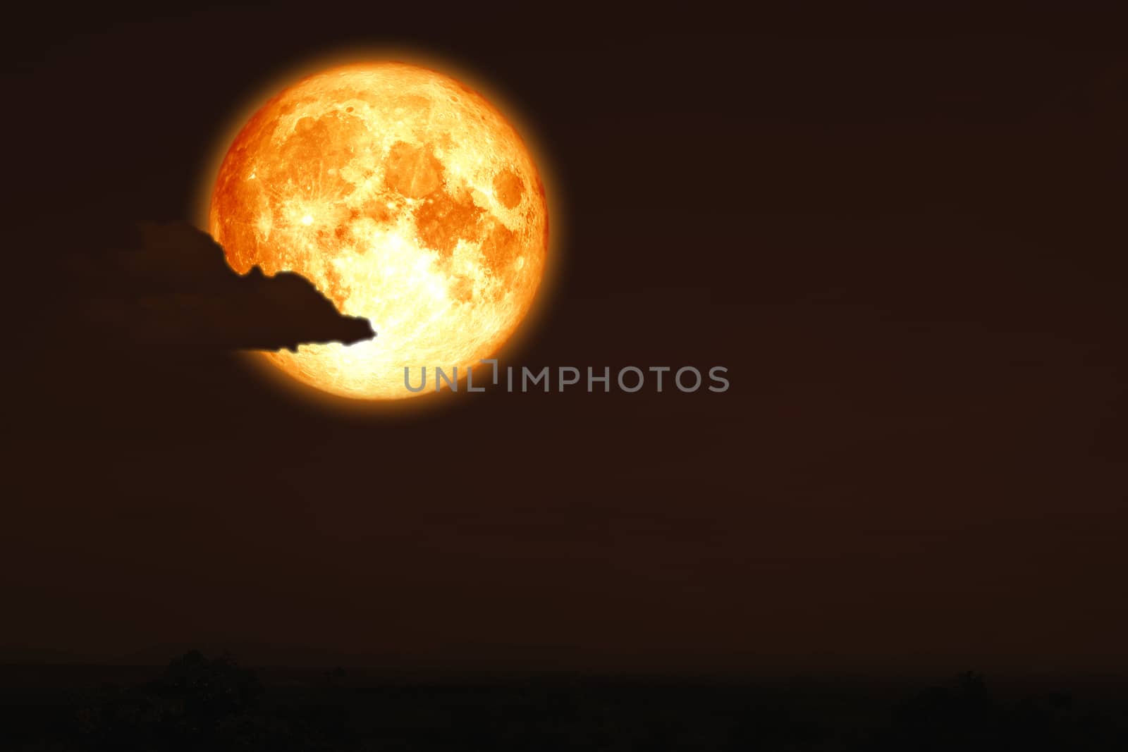 full egg moon back on silhouette mountain on night sky, Elements of this image furnished by NASA