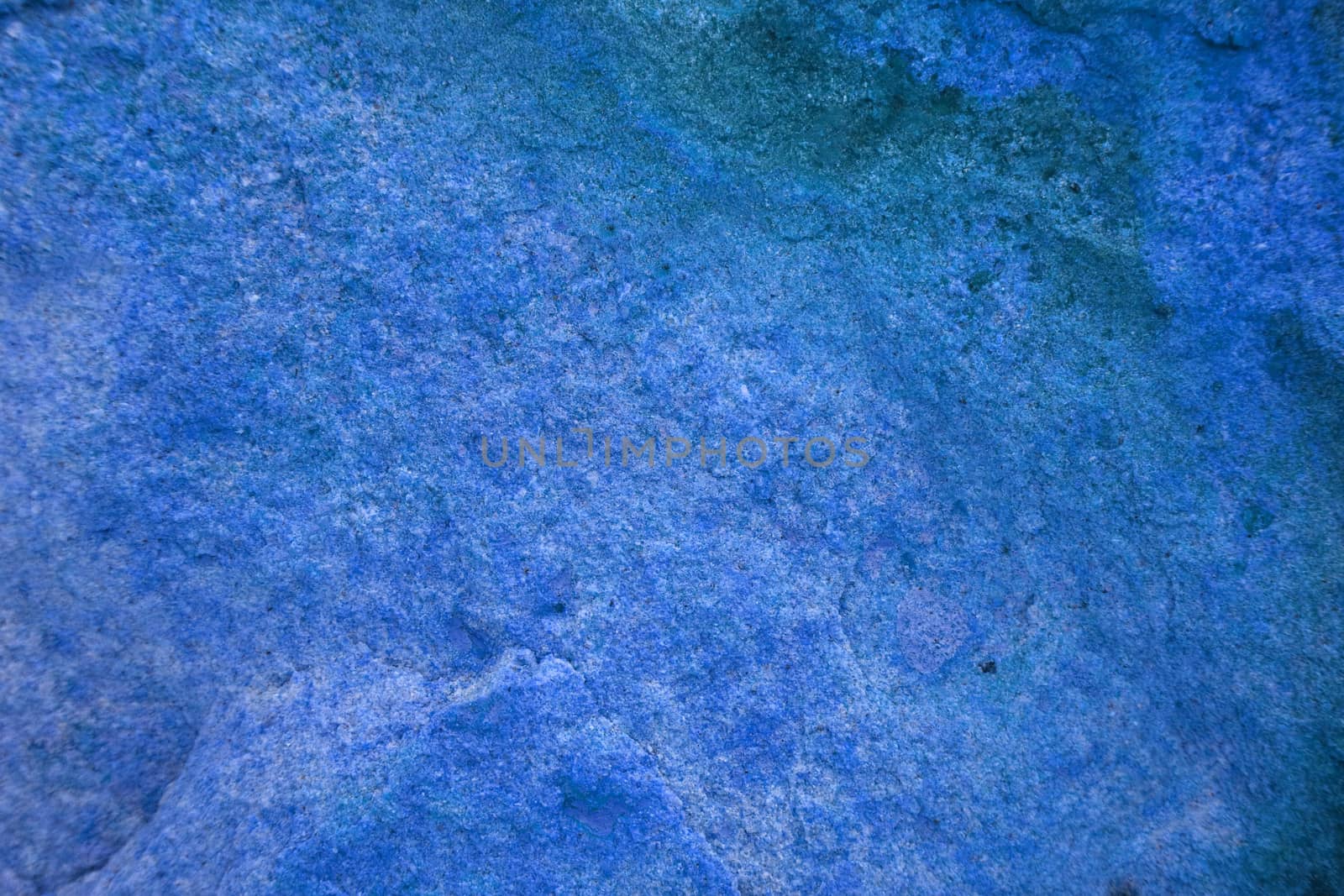 ancient blue mineral granite stone surface of cave for interior wallpaper and background