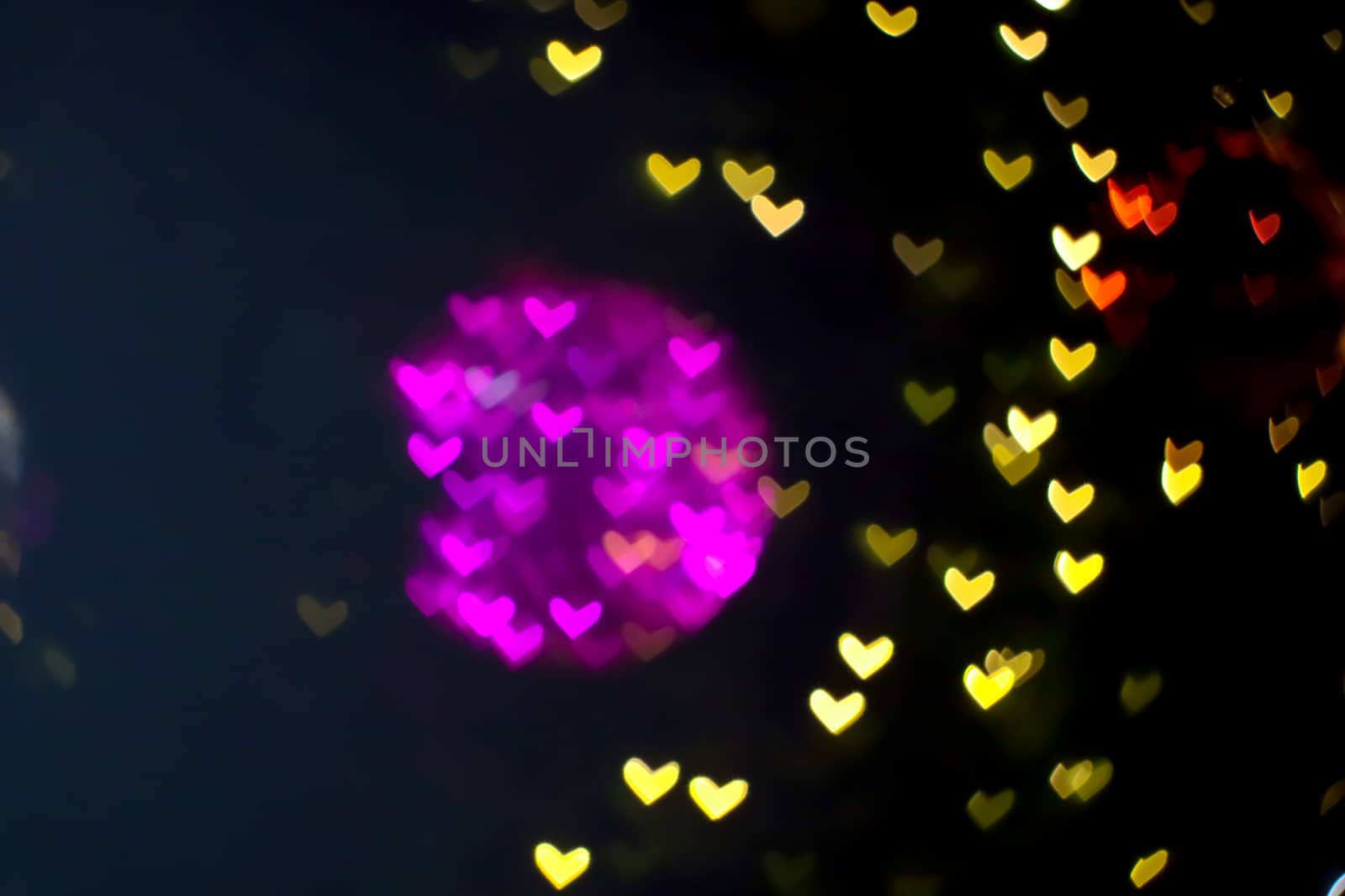 magenta ball abstract bokeh and blur heart shape love valentine's day colorful night light