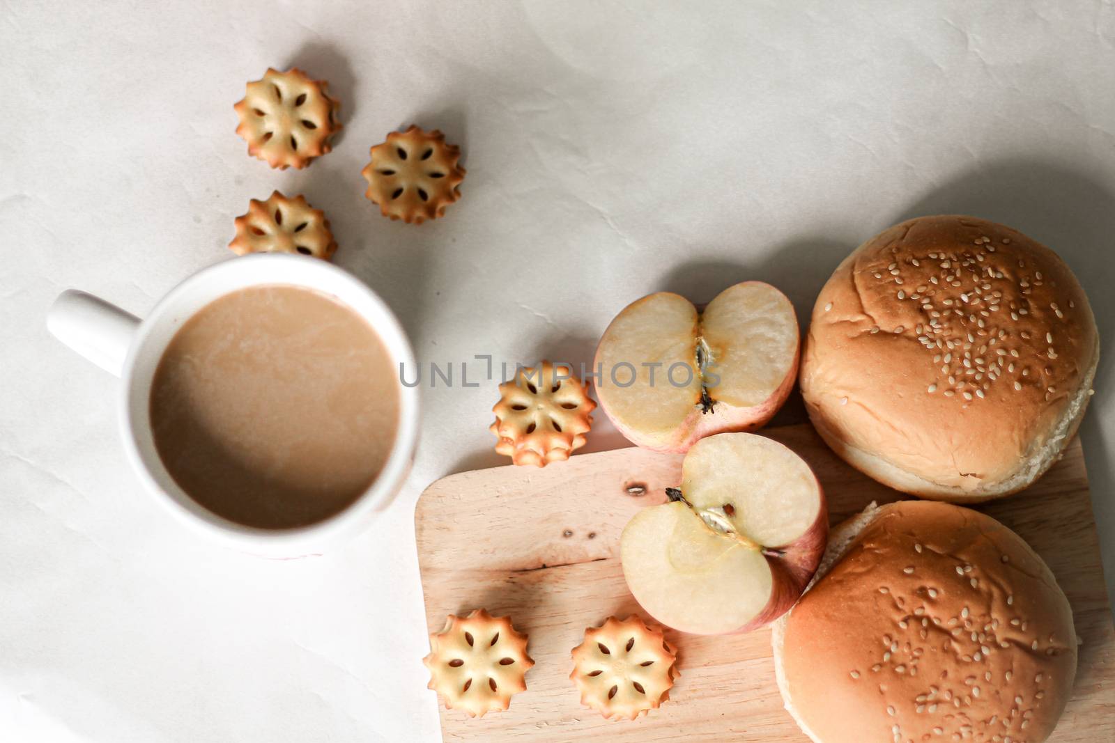 Home baked bread, biscuits and apple slices showing the comfort and cozy feeling of being at home