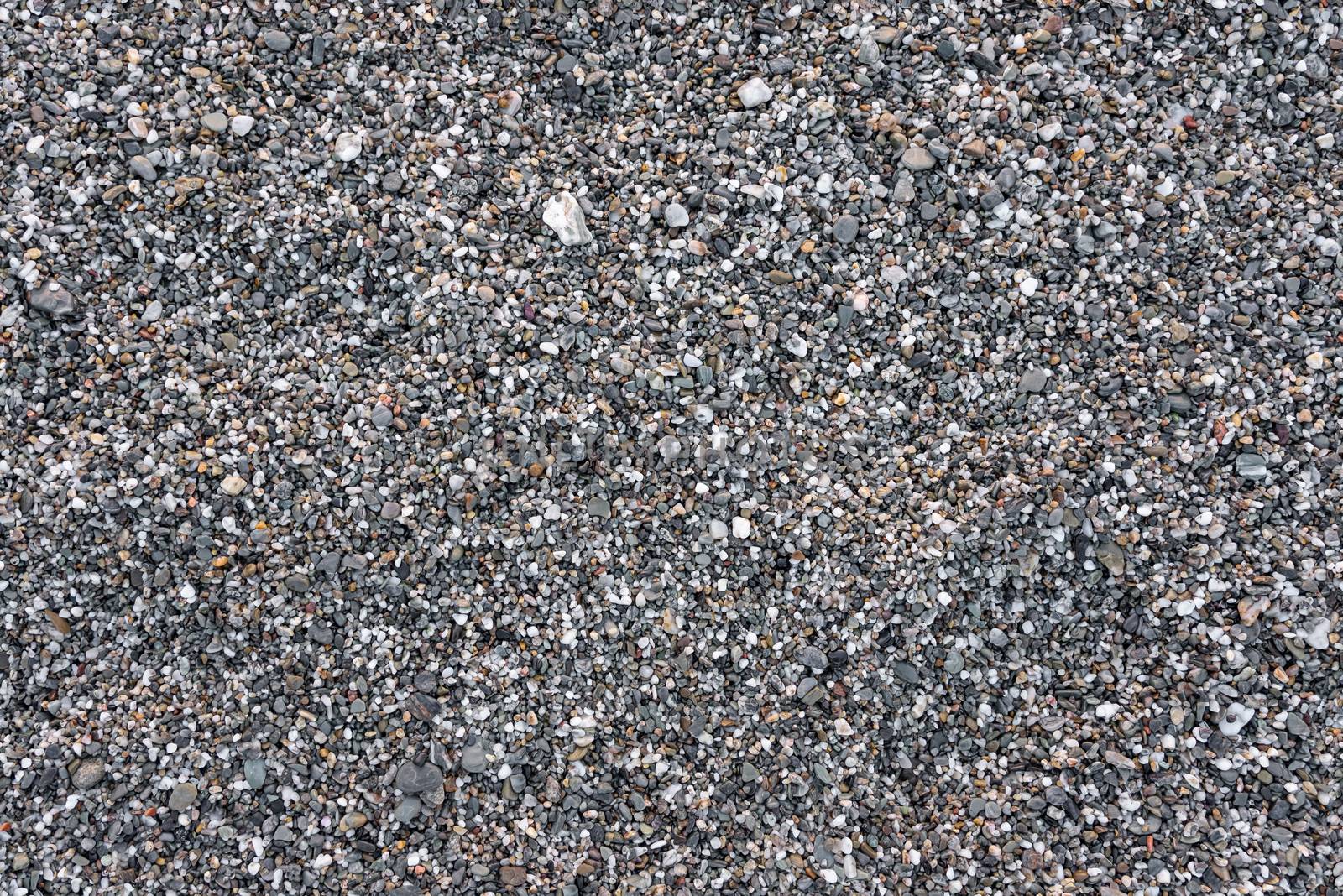 Seamless background ot texture made of gray pebbles