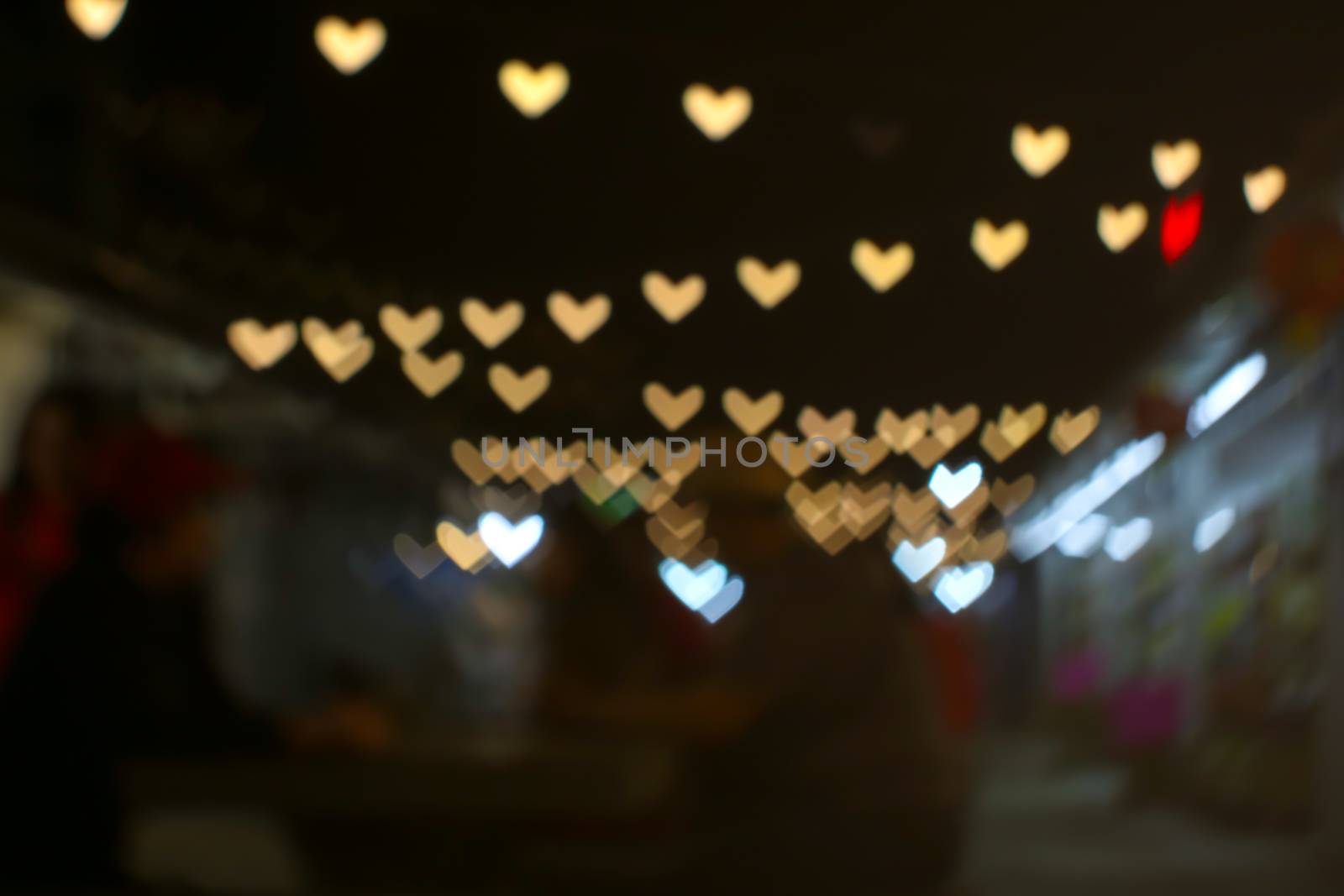 imgae of bokeh and blur line heart shape love valentine day night light in the garden vintage tone