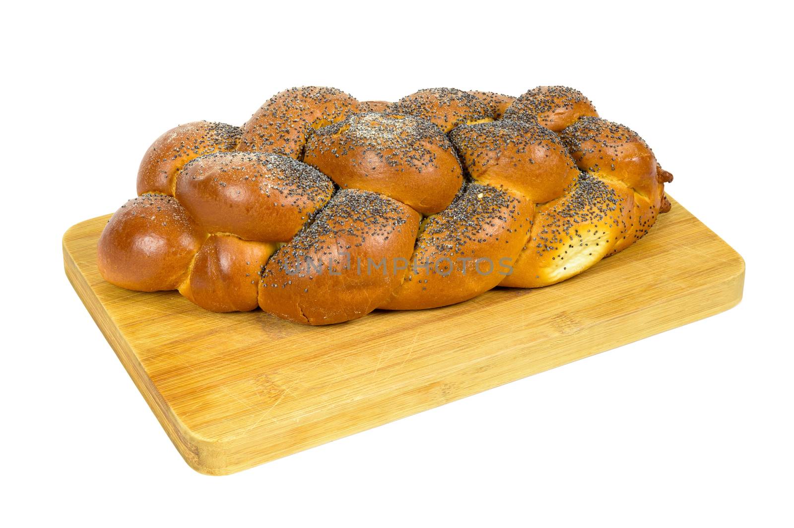 Challah bread on chopping board by mkos83