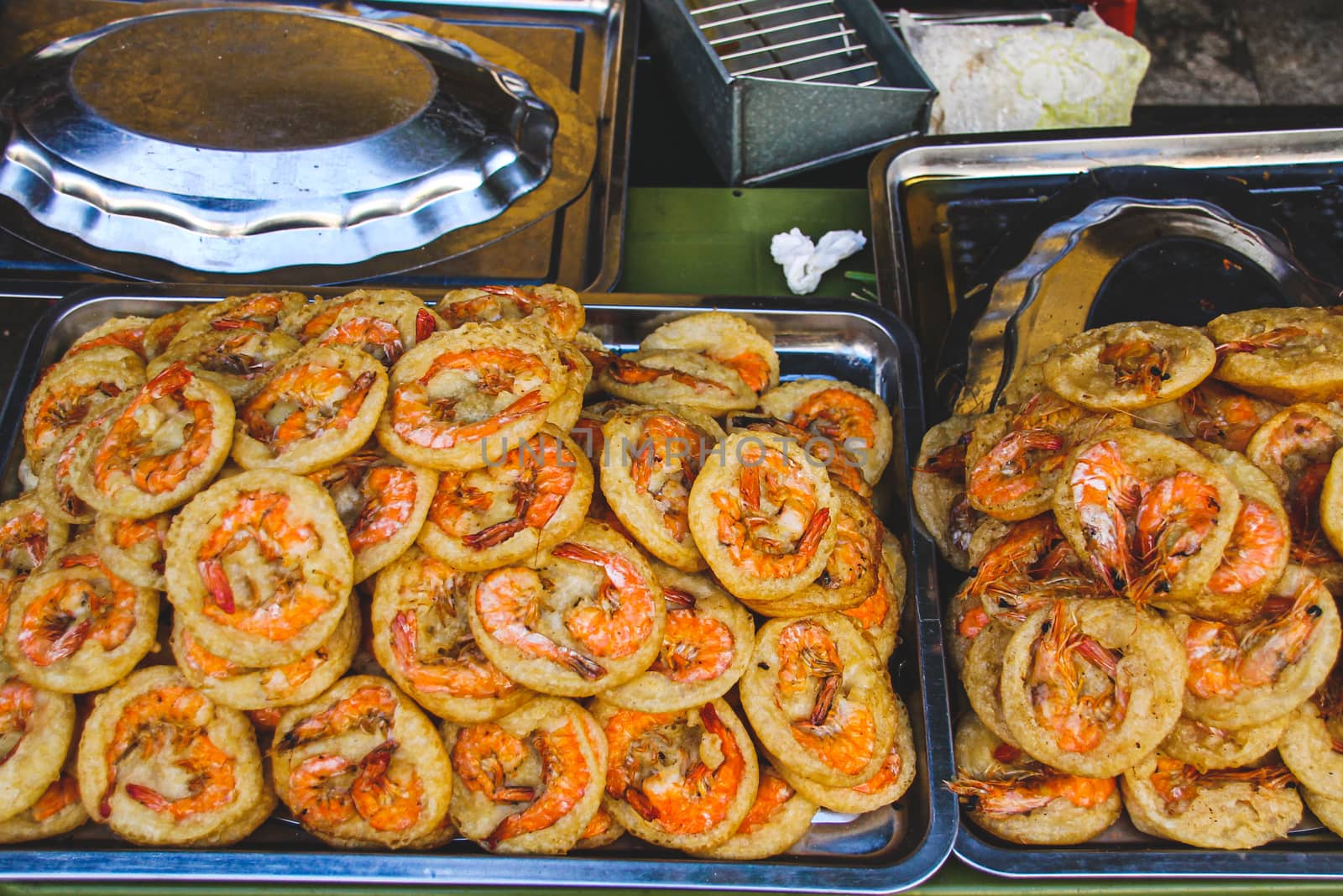 Vietnamese shrimp pancake or Banh Tom, a popular local delicacy sold in the streets of Hanoi, Vietnam