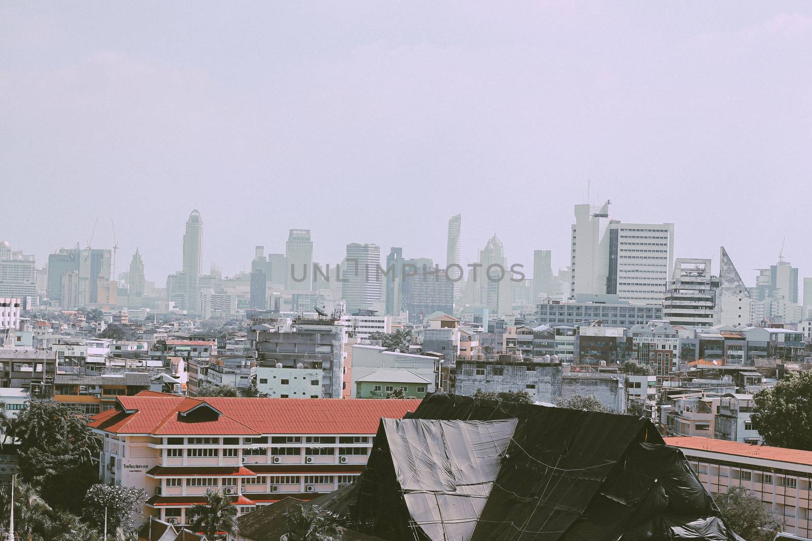 Crowded skyline of Bangkok, Thailand covered in smog showing the severity of air pollution in the city