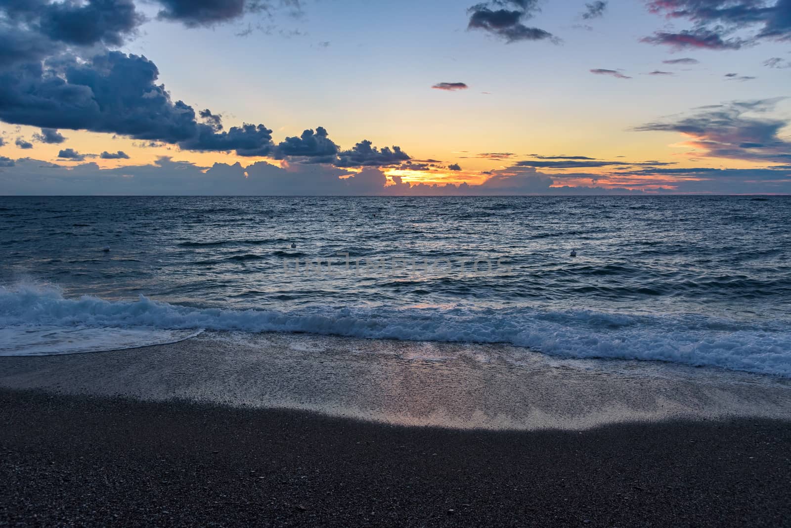 Picturesque sunset on the Calabrian beach in Italy