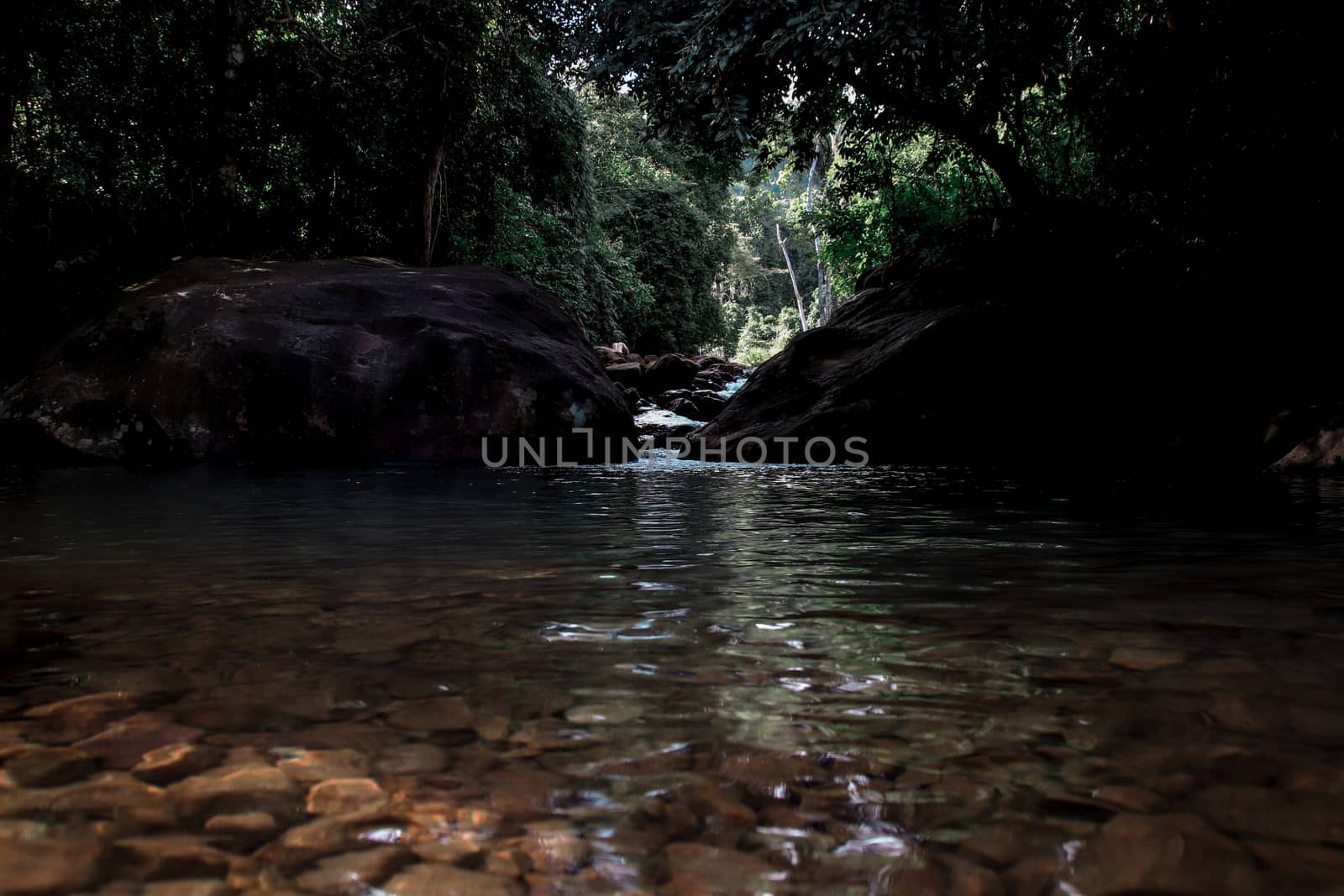 Dark and moody cinematic look of a waterfall in the Bokor National Park in Kampot, Cambodia