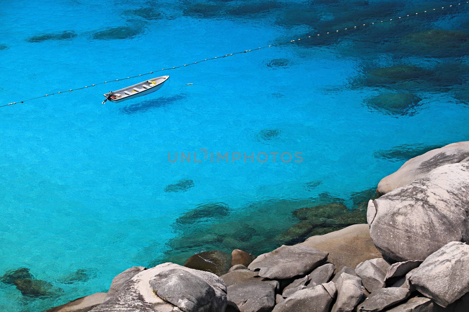 White sand beach The water is so clear that it looks like a boat is floating by Mercedess