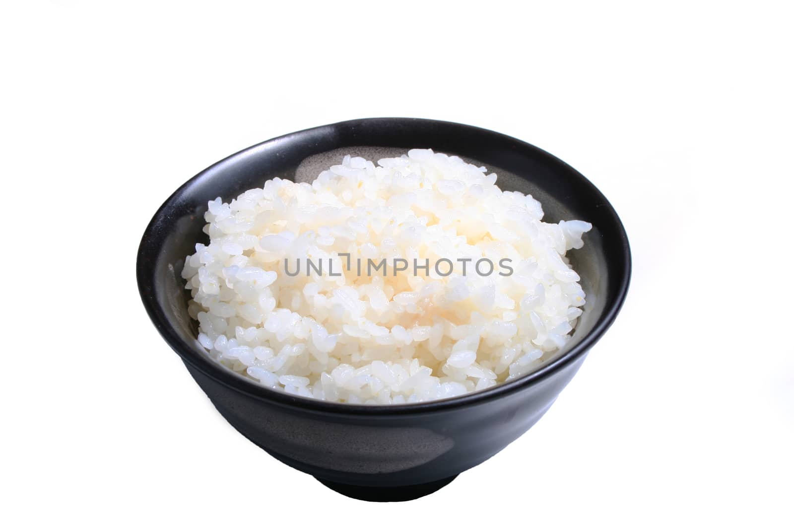 Japanese rice in earthen cup isolated on a white background by Mercedess