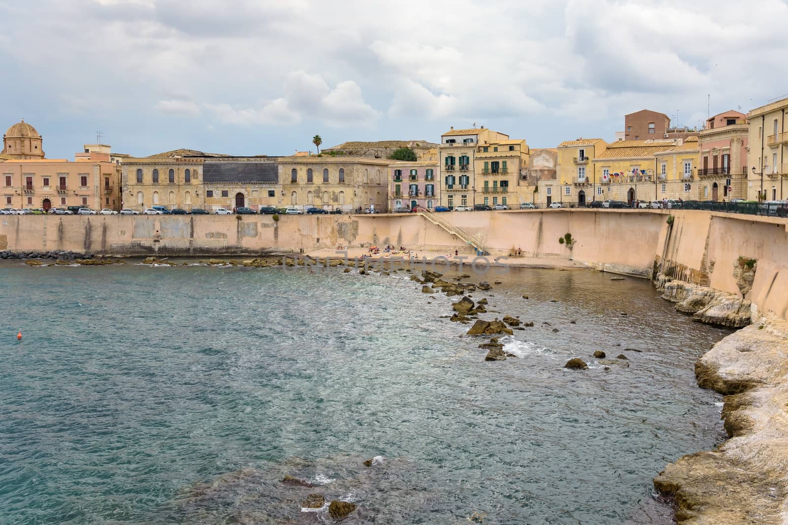 Waterfront of Ortygia Island with small pebble beach by mkos83