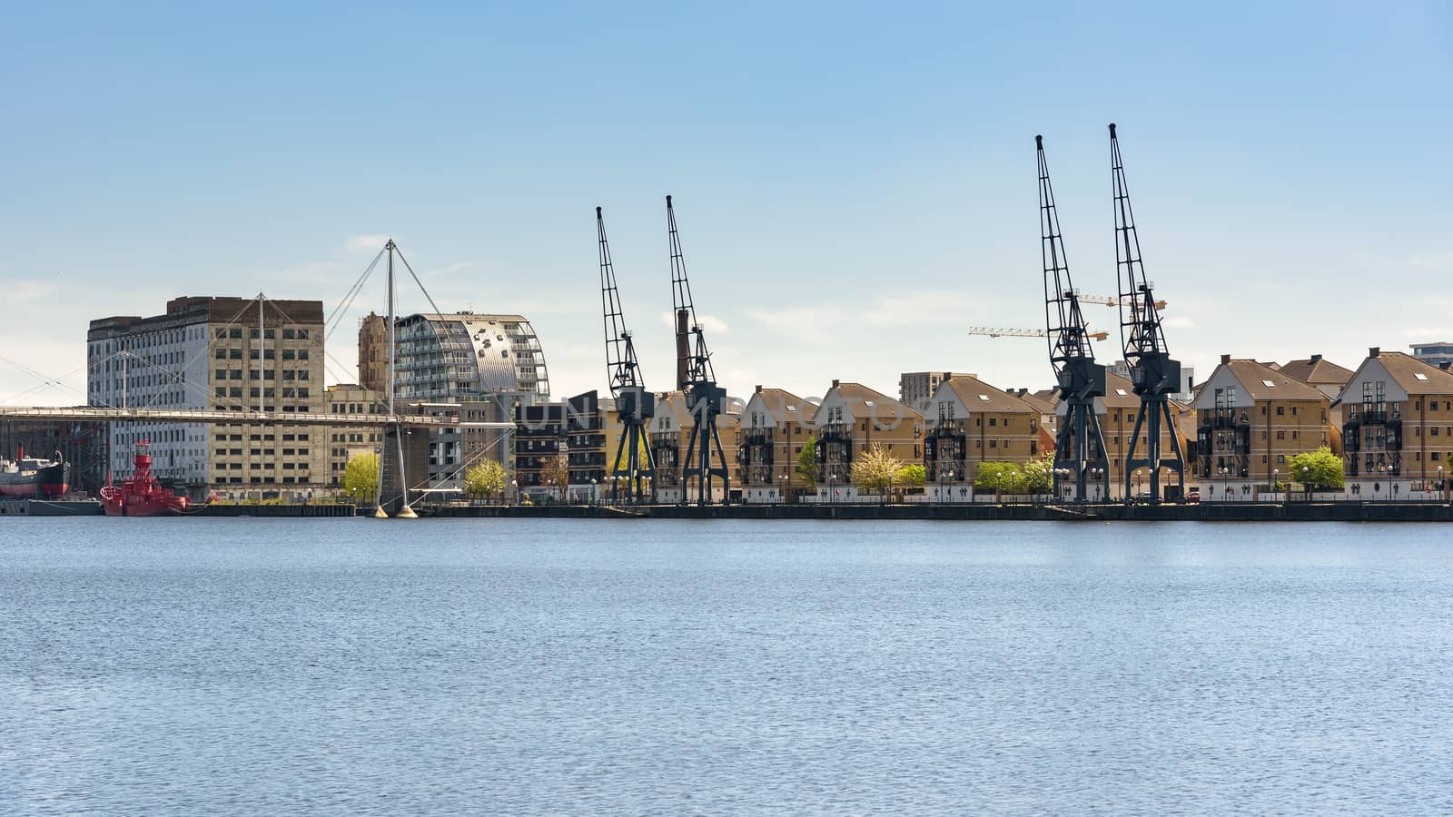 Panoramic view of houses at Royal Victoria Dock in London by mkos83