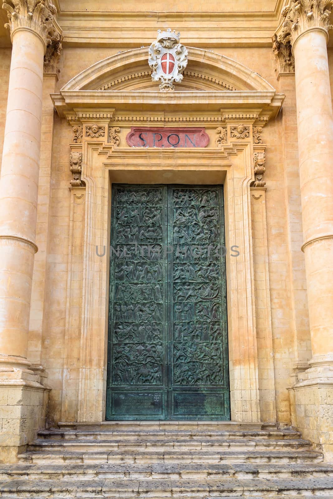 Carved door of Saint Nicholas of Myra Cathedral in Noto by mkos83