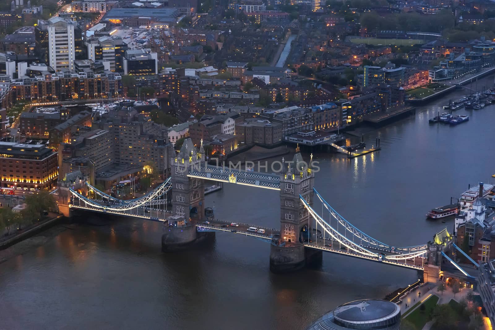 Aerial view of Tower Bridge in London at an overcast day at dusk