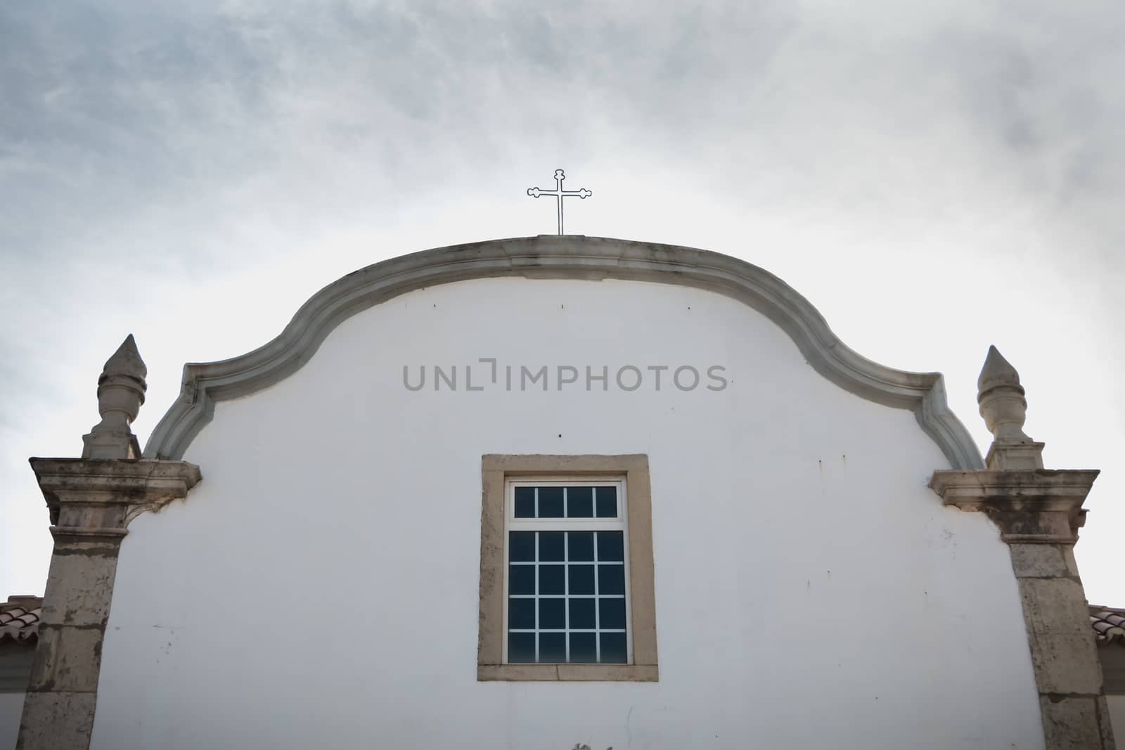 Albufeira, Portugal - May 3, 2018: architectural detail of the Church of Saint Sebastian (Igreja de Sao Sebastiao) in the city center on a spring day