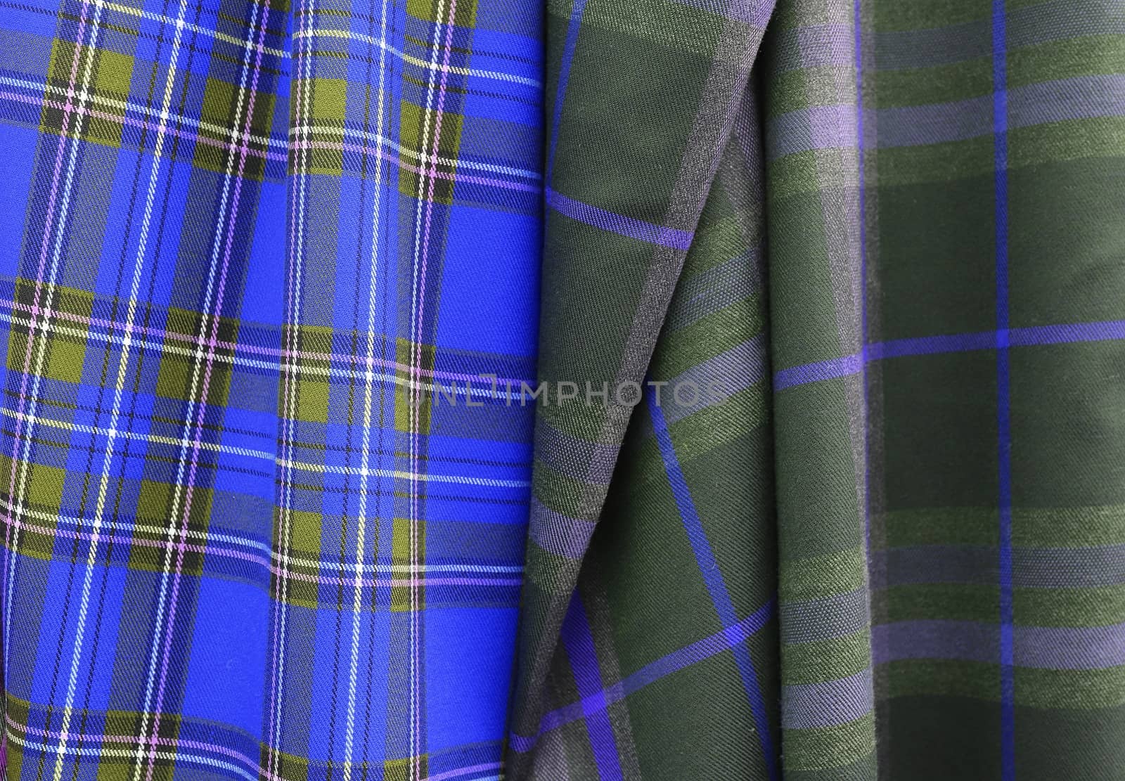 Detailed close up view on samples of cloth and fabrics in differ by MP_foto71