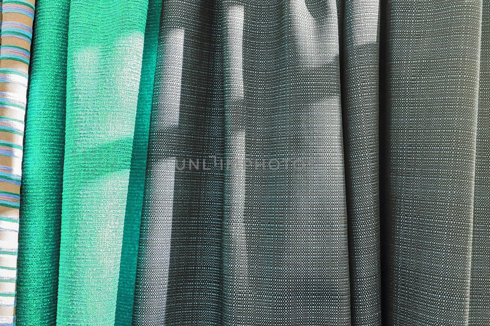 Detailed close up view on samples of cloth and fabrics in differ by MP_foto71